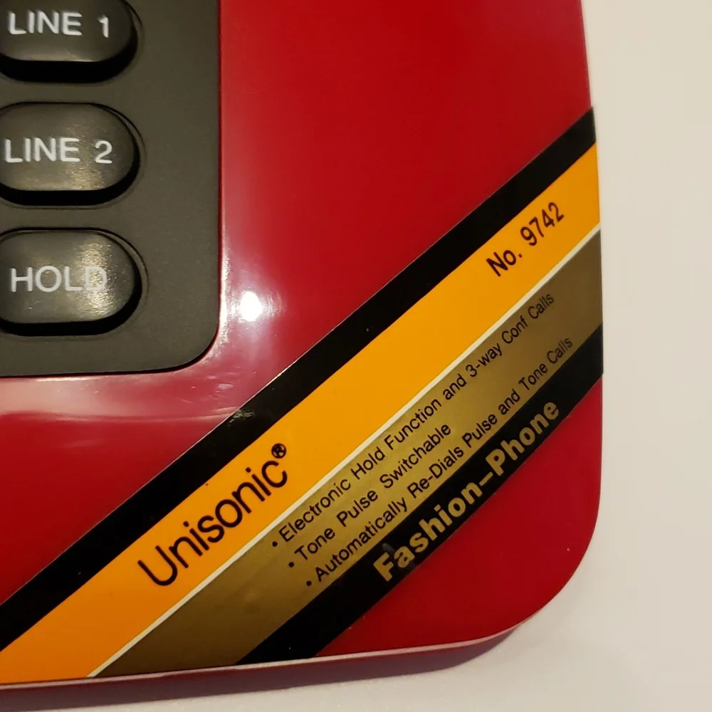 Host Pick Vintage Unisonic NIB Red & Black Sleek Phone